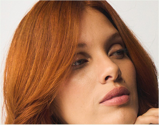 Model with healthy smooth copper hair